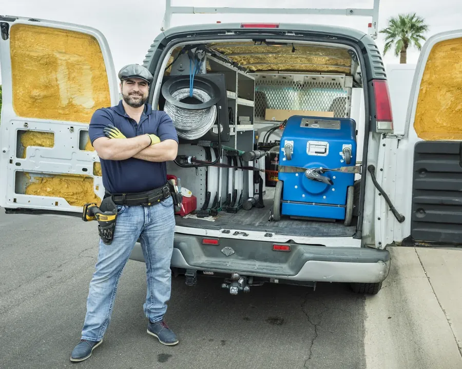 Shimon Kalifi, owner of Forever Vent, at his work van in Phoenix, Arizona